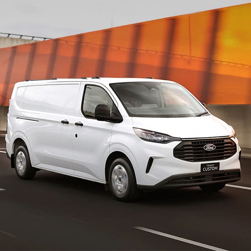 white ford transit van driving on new zealand roads