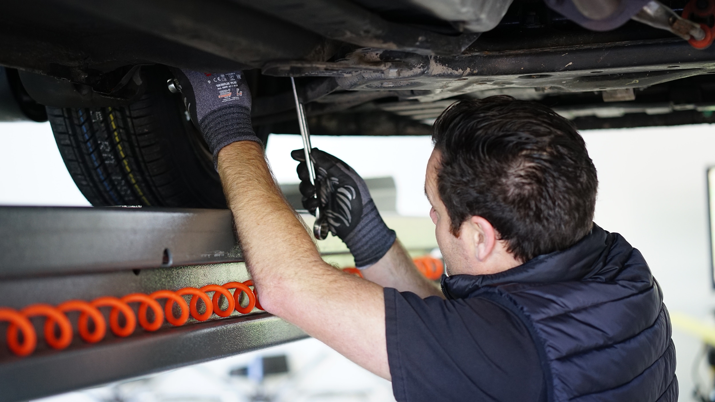 Technician inspecting vehicle at Ingham Automotive in Hamilton for warrant of fitness WOF inspection