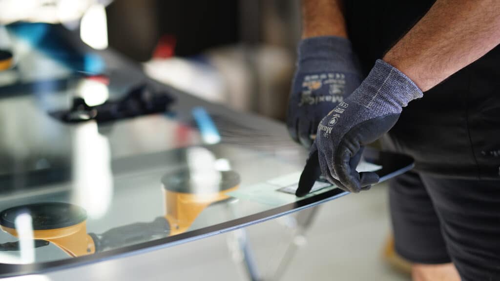 Windscreen being replaced new at Ingham Automotive in Te Rapa, Hamilton.