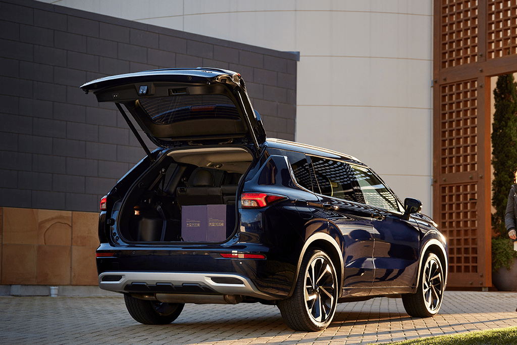 New 2022 Mitsubishi Outlander in dark blue with rear door boot open